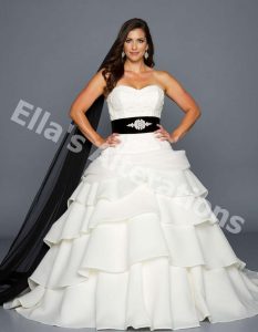 Wedding dress with black sash and belt.