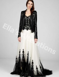 Black and white wedding dress with a flowing skirt.